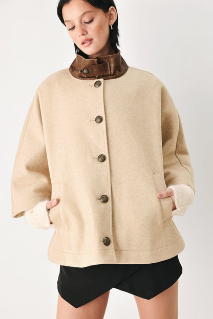 CITY IN MOTION BUCKLED CAPELET JACKET